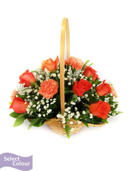 Roses and carnations presented in handle basket