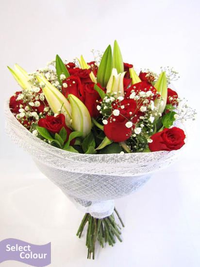 Roses and lilies presented in netting