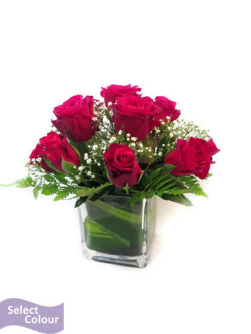 Roses in square cut vase