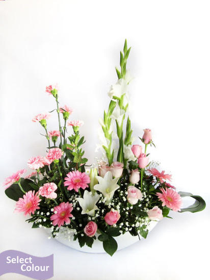 Mixed flowers in ceramic pot