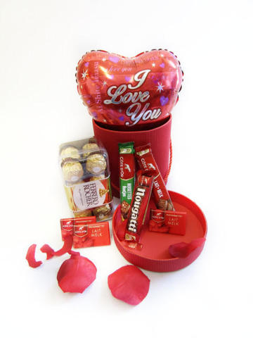 Chocolates with balloon in gift box