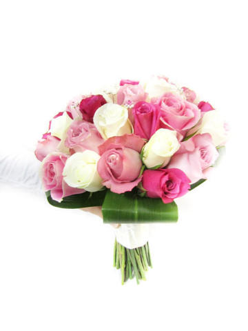 Pink and cream roses in bridal bouquet