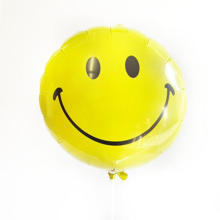 Emoji smiley face balloon
