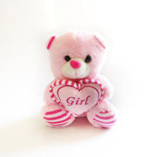 Pink teddy with girl on heart