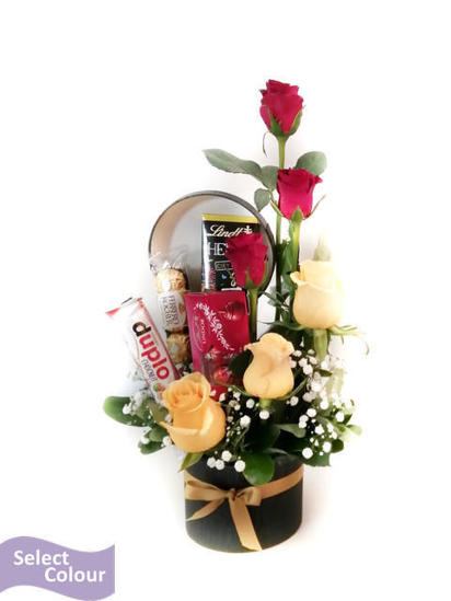 Roses with ferrero and lindt chocolates in hat box