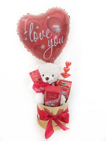 Chocolates with teddy bear and balloon in gift box