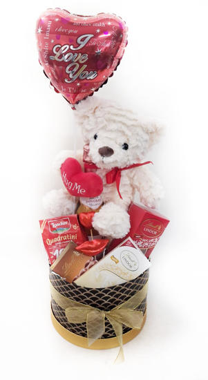 Chocolates with teddy bear and balloon in gift box